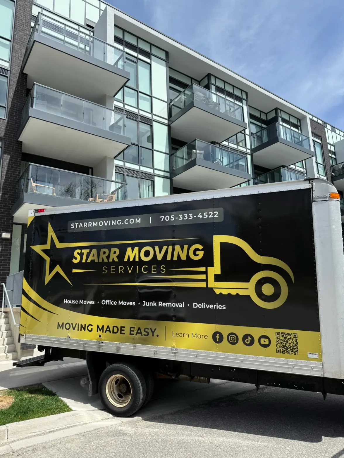 starr-moving-truck-modern-apartment-building